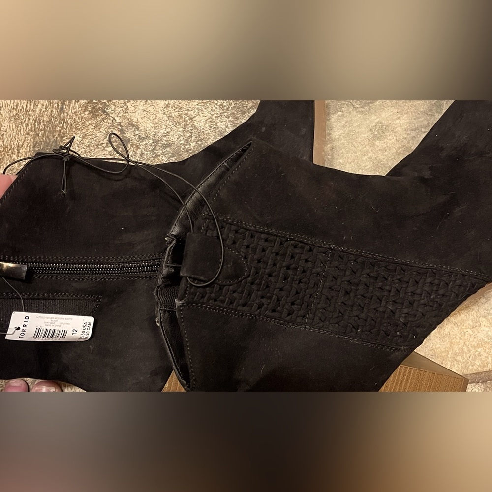 New boots black with heals never worn  size 12